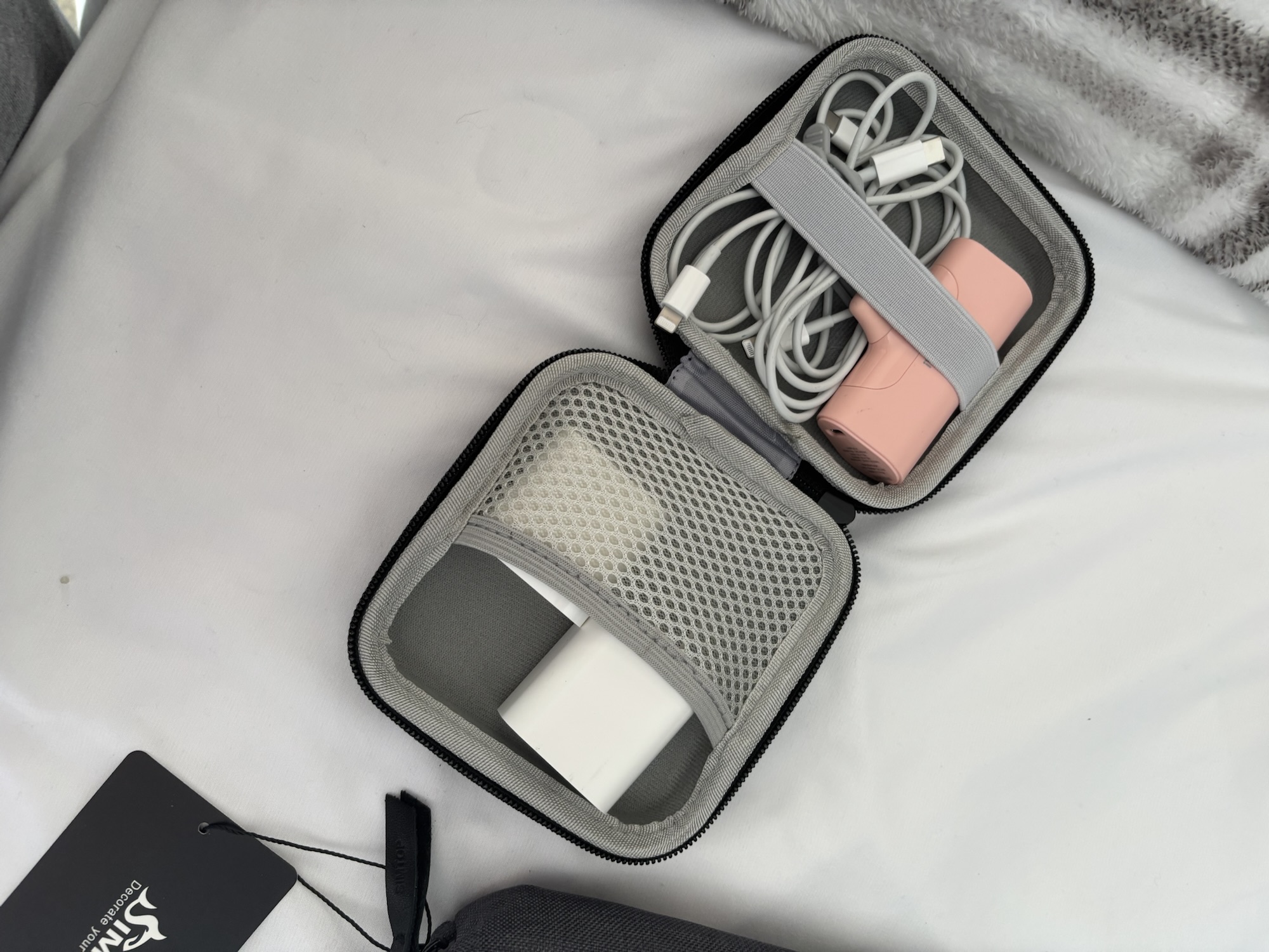 Comparing travel cases for cords and chargers